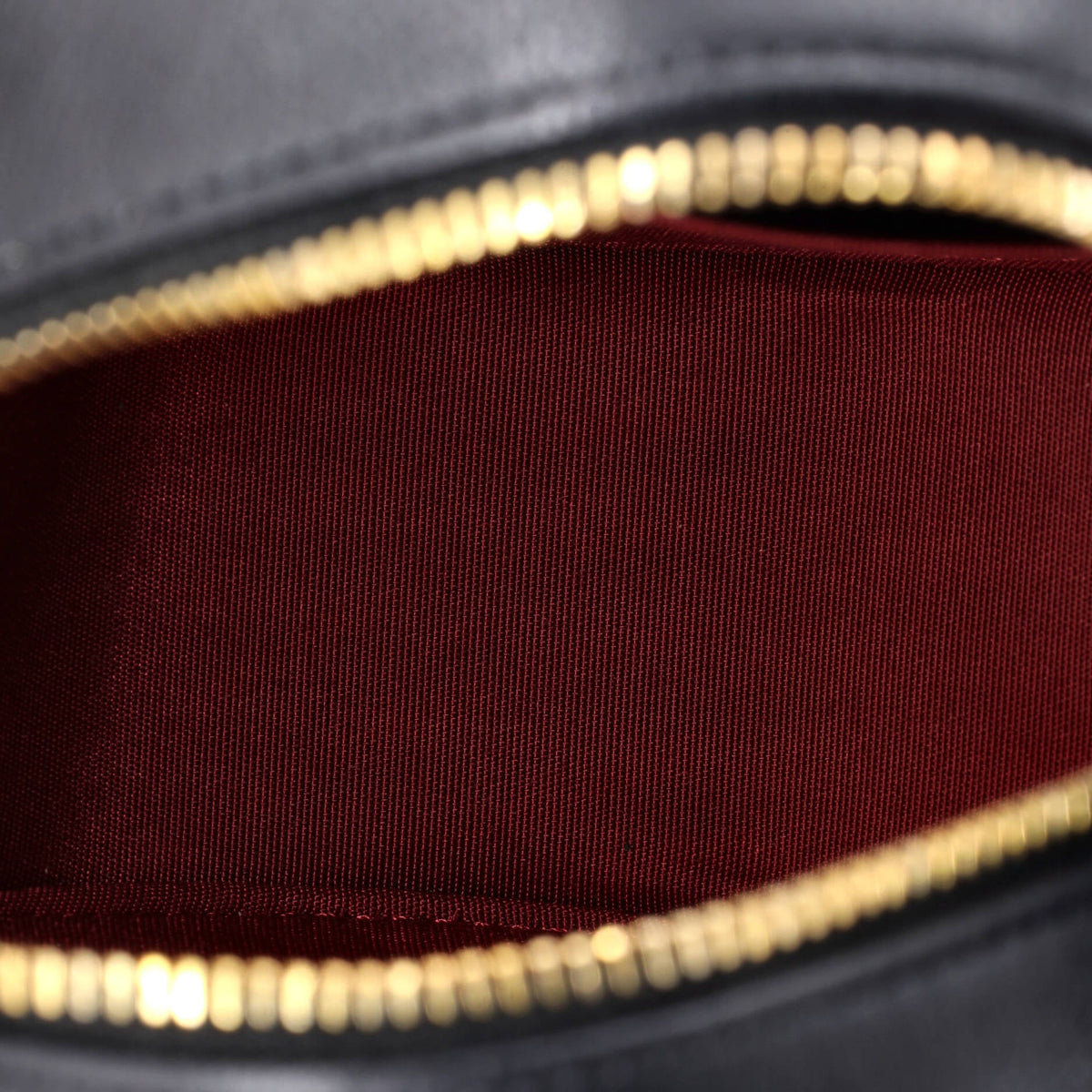 19 Round Clutch with Chain Quilted Leather