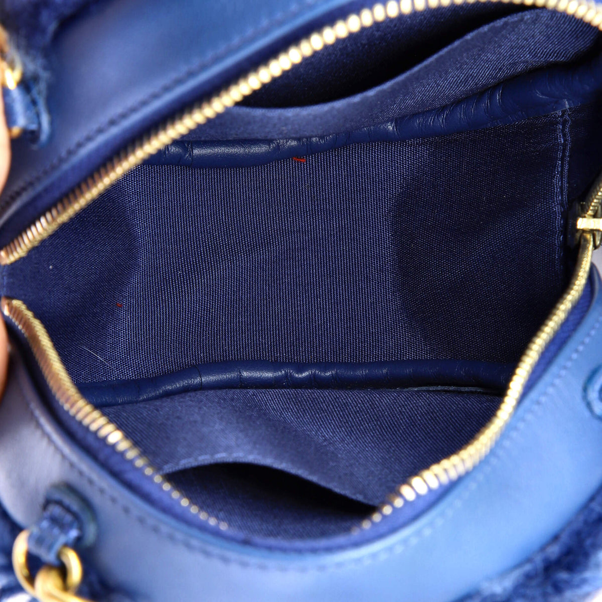 19 Round Clutch with Chain Quilted Shearling