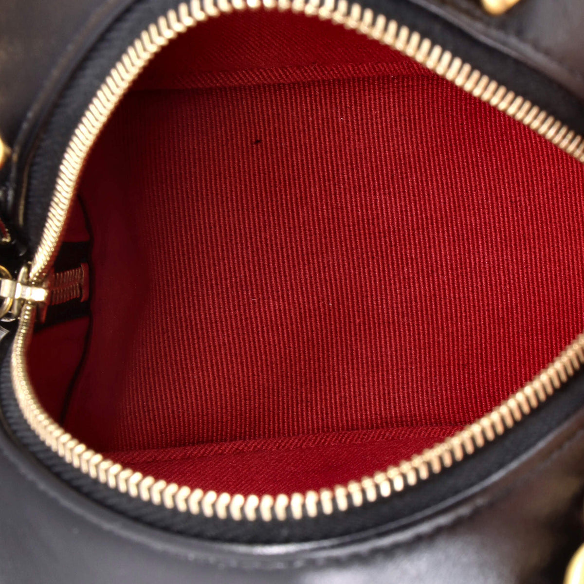 19 Round Clutch with Chain Quilted Leather