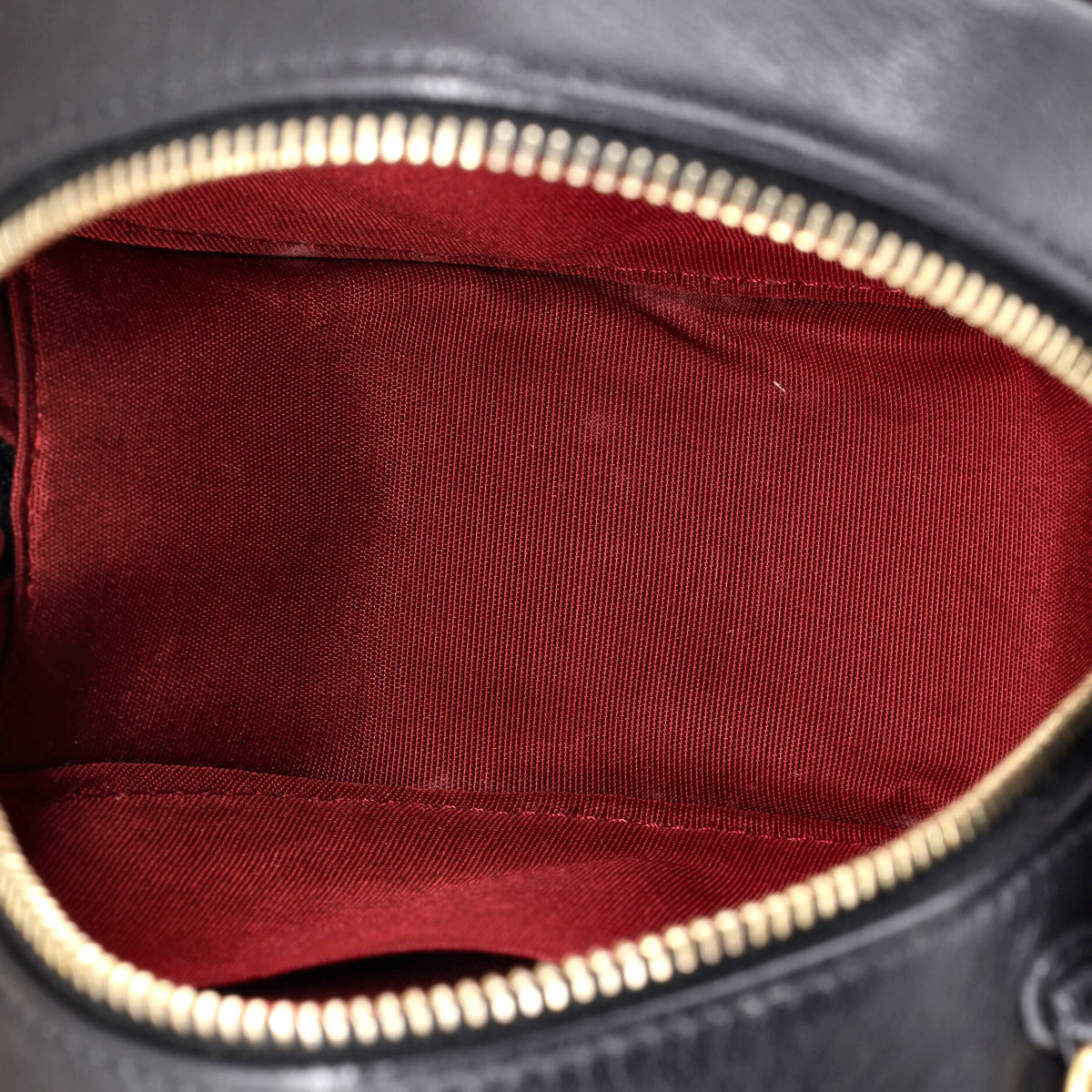 19 Round Clutch with Chain Quilted Leather