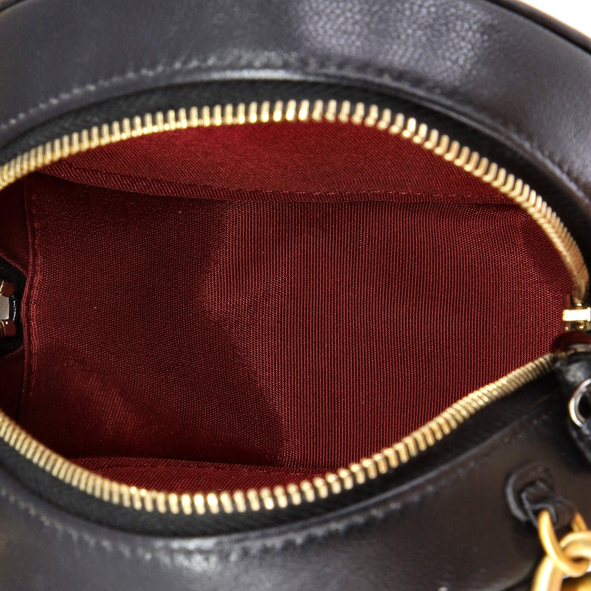 19 Round Clutch with Chain Quilted Leather