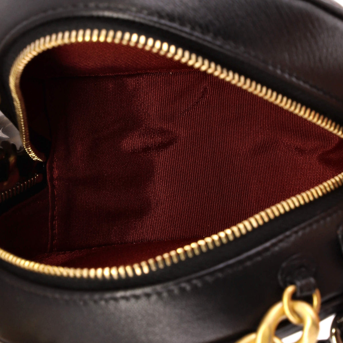 19 Round Clutch with Chain Quilted Leather