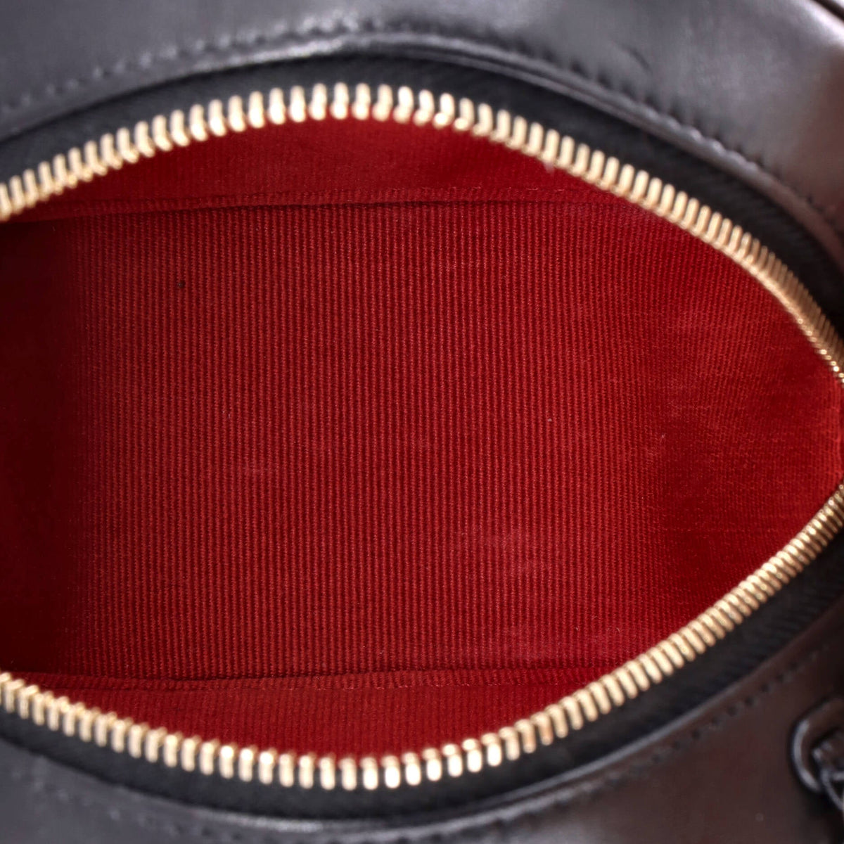 19 Round Clutch with Chain Quilted Leather