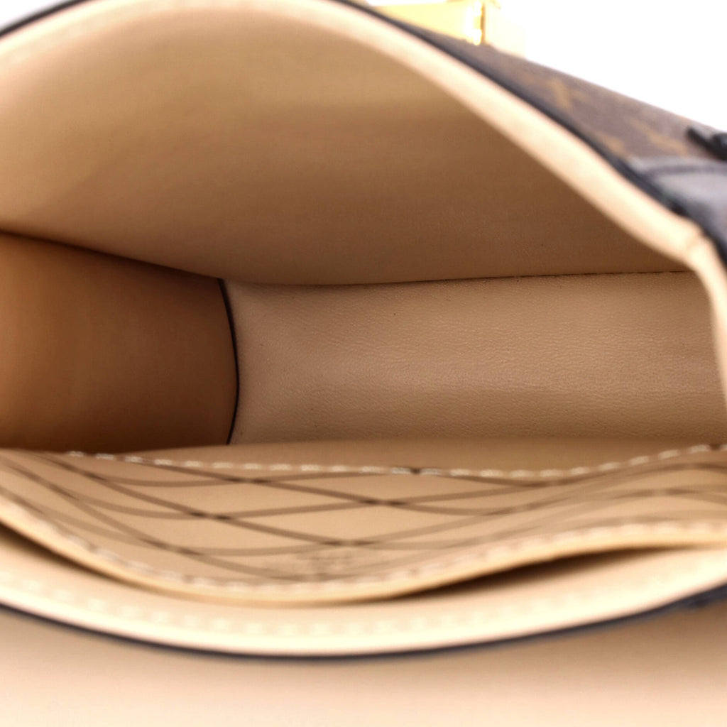 Vertical Trunk Pochette Monogram Canvas