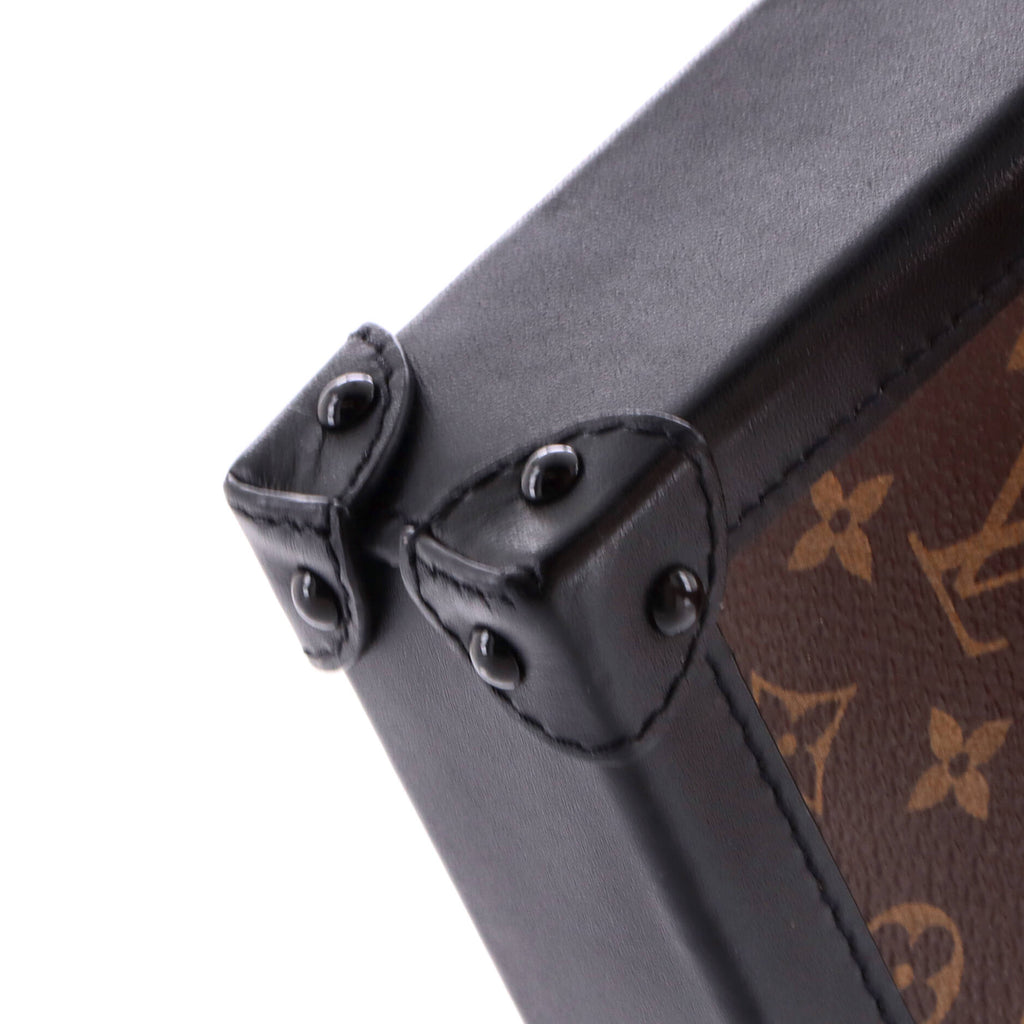 Vertical Trunk Pochette Monogram Canvas