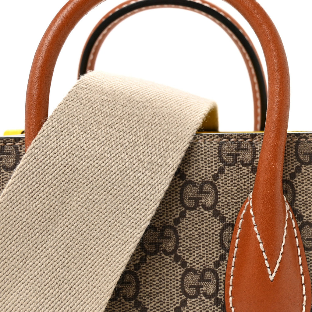 GG Supreme Monogram Textured Dollar Calfskin Heart Interlocking G Mini Vertical Tote Beige Ebony Harness Brown Yellow