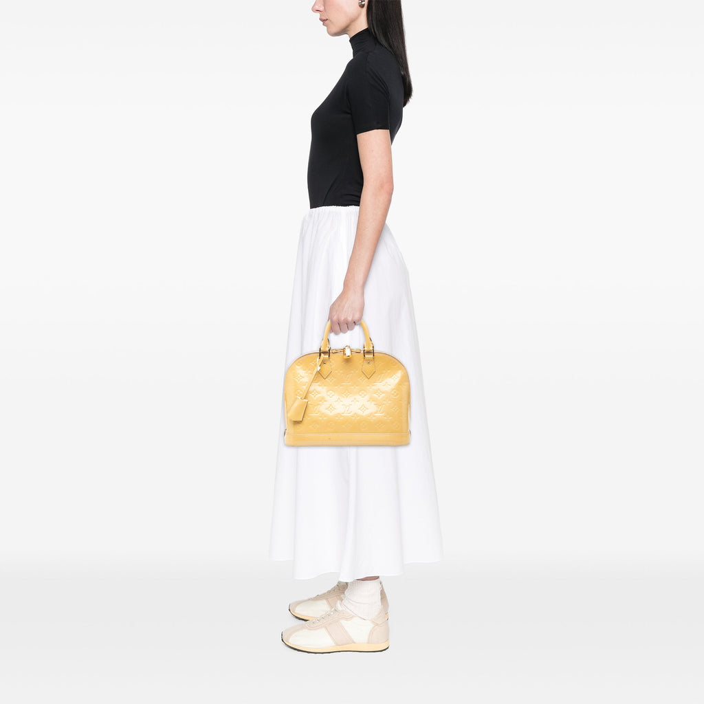 Alma Handbag Monogram Vernis PM