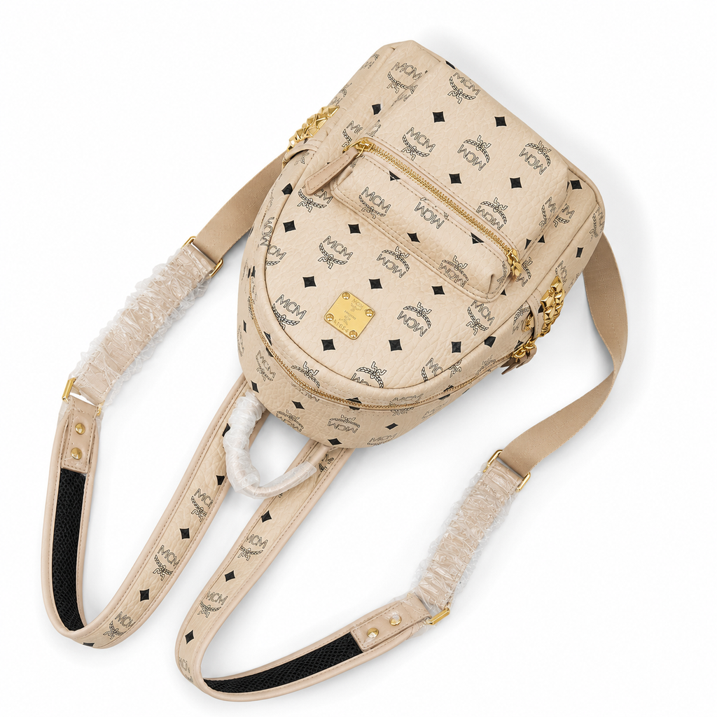 MCM Stark Mini Backpack in Beige Visetos – Signature Monogram Side Studs Backpack, MMK6SVE41IG001, 26x21.5x10.5cm