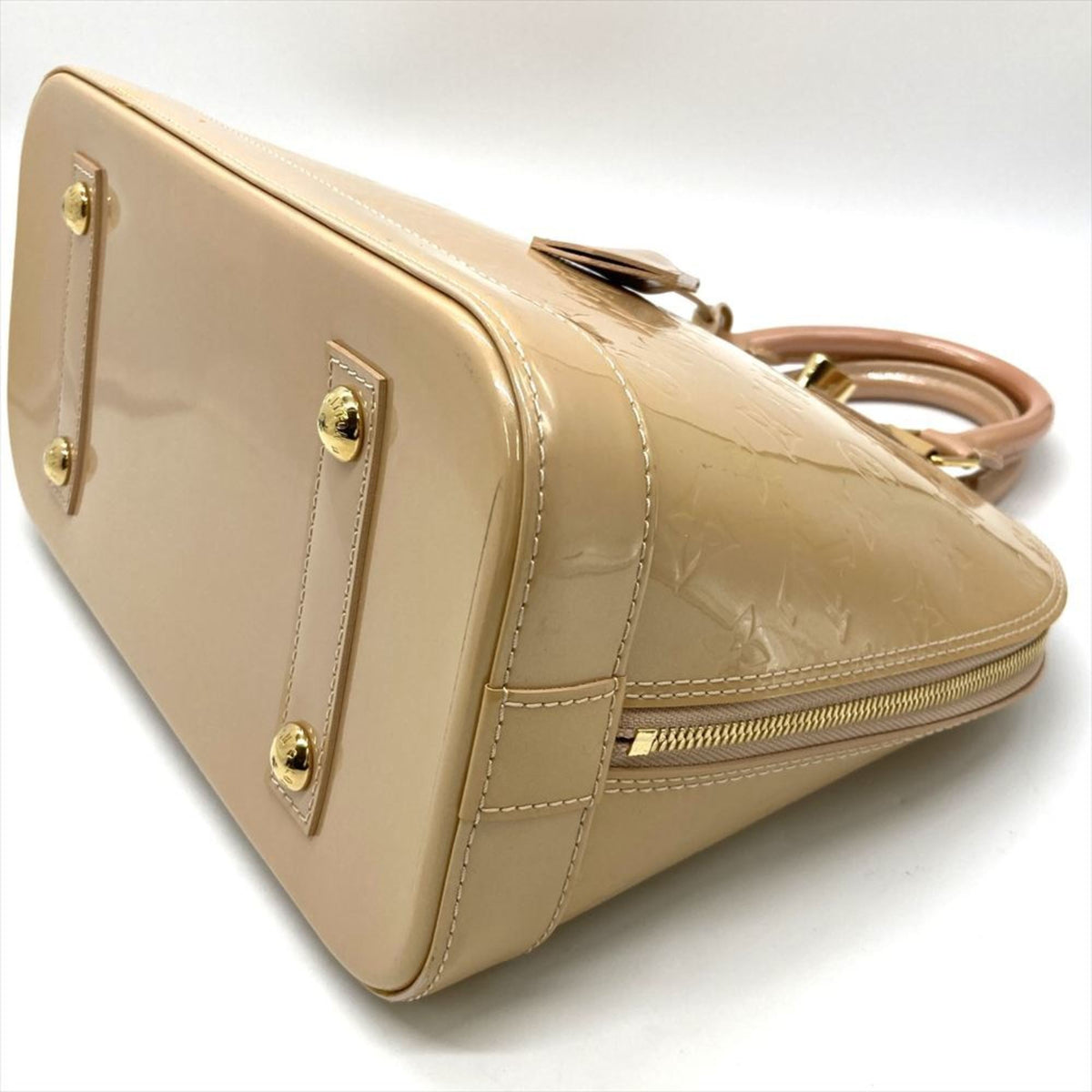 Alma Handbag Monogram Vernis PM