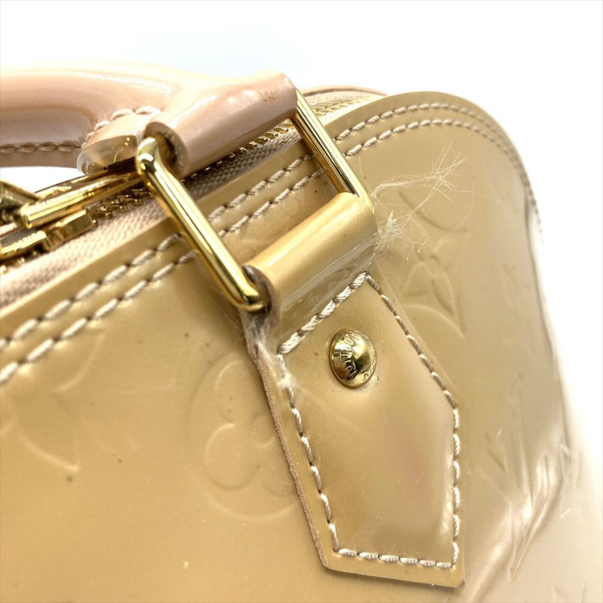Alma Handbag Monogram Vernis PM