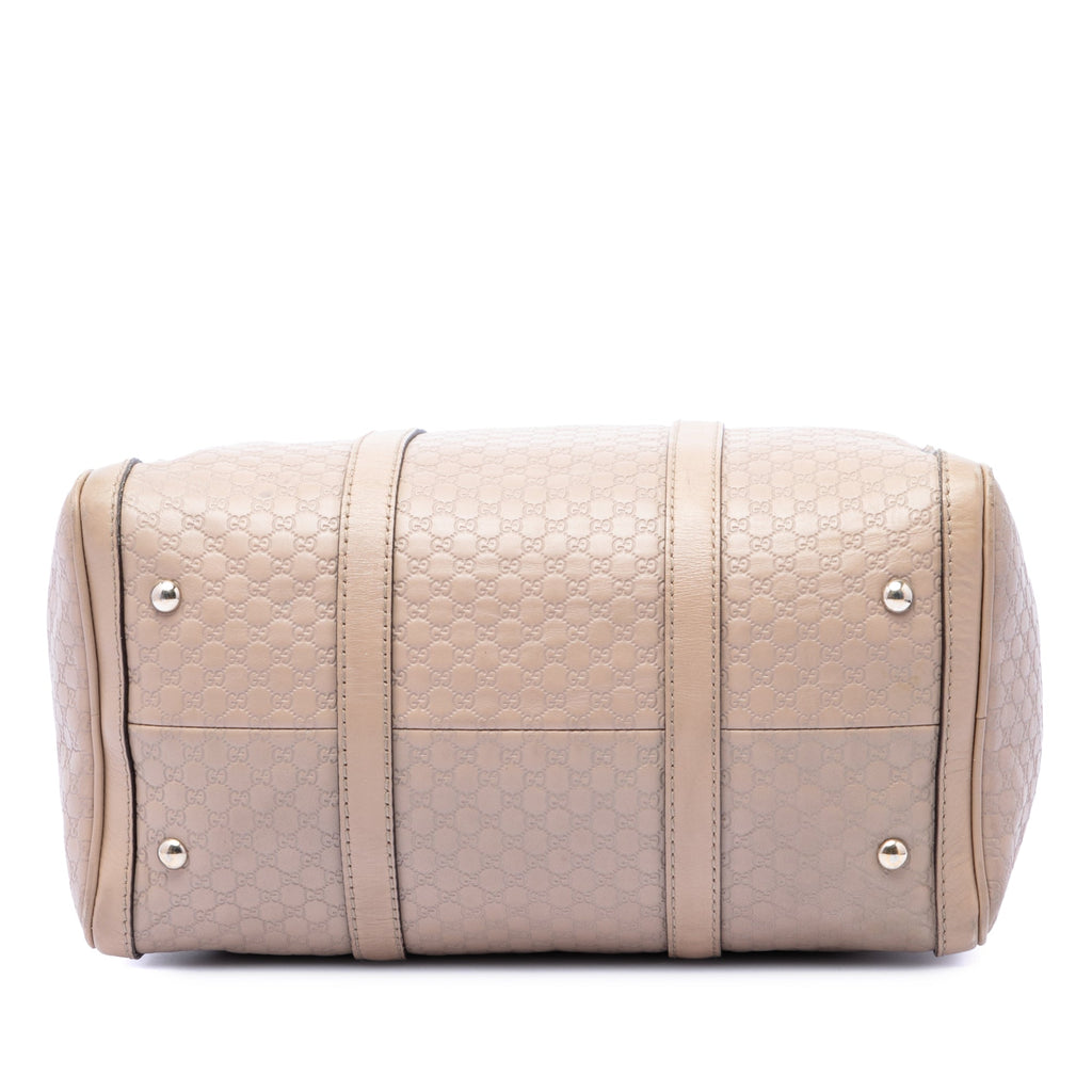 Joy Boston Bag Microguccissima Leather Medium