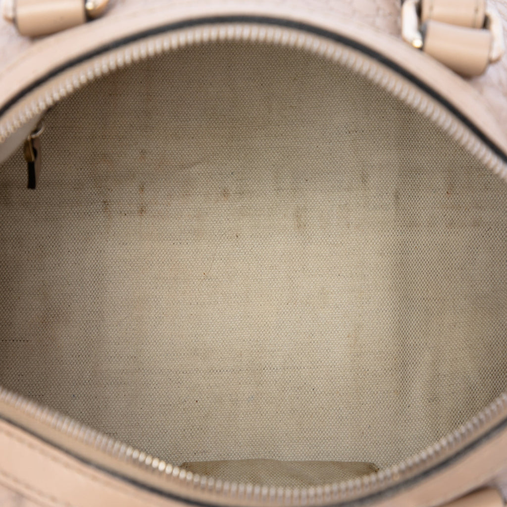 Joy Boston Bag Microguccissima Leather Medium
