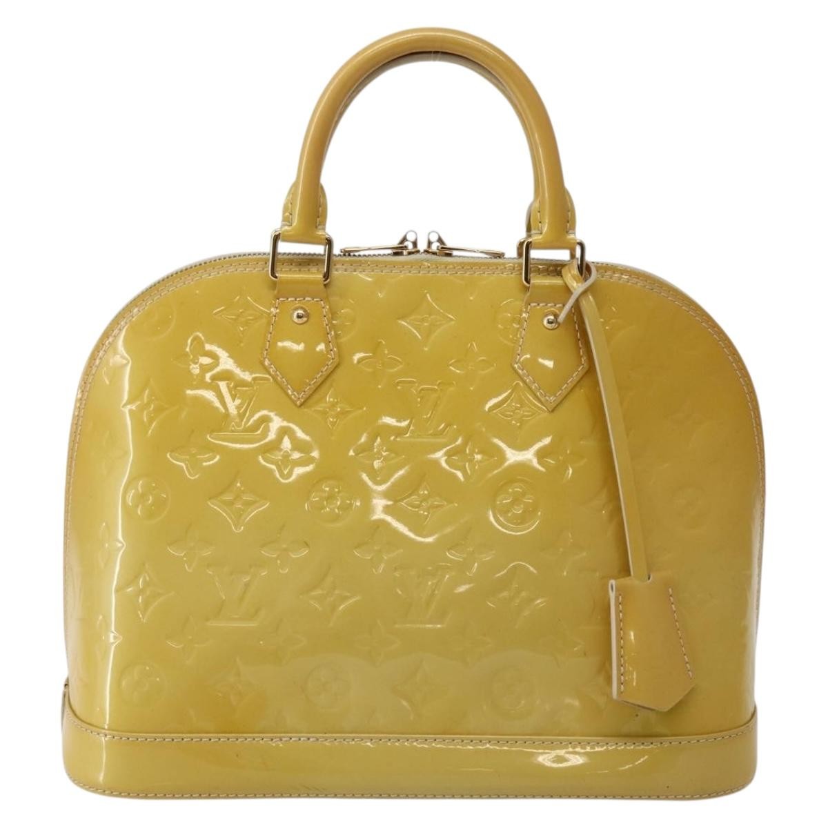 Alma Handbag Monogram Vernis PM