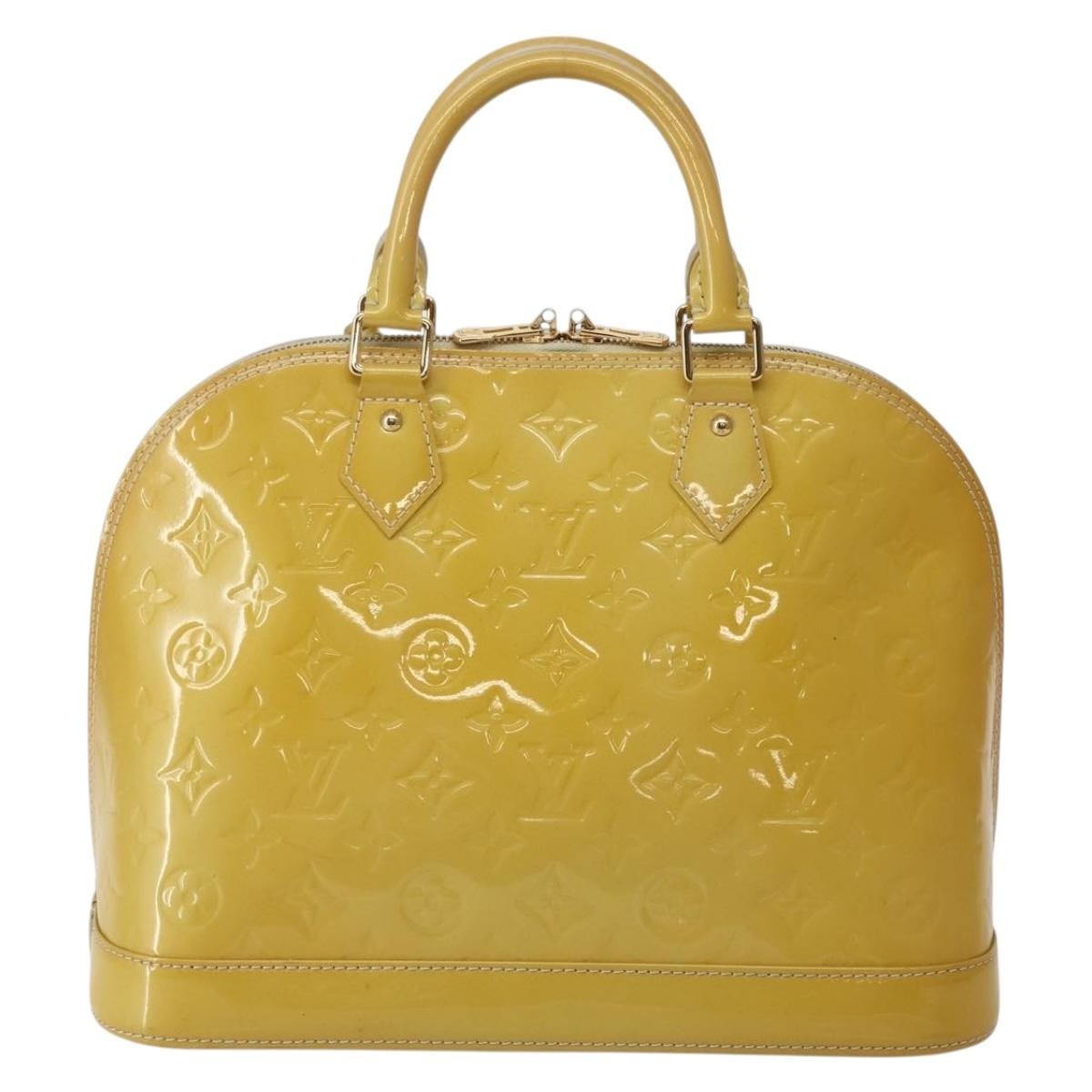 Alma Handbag Monogram Vernis PM