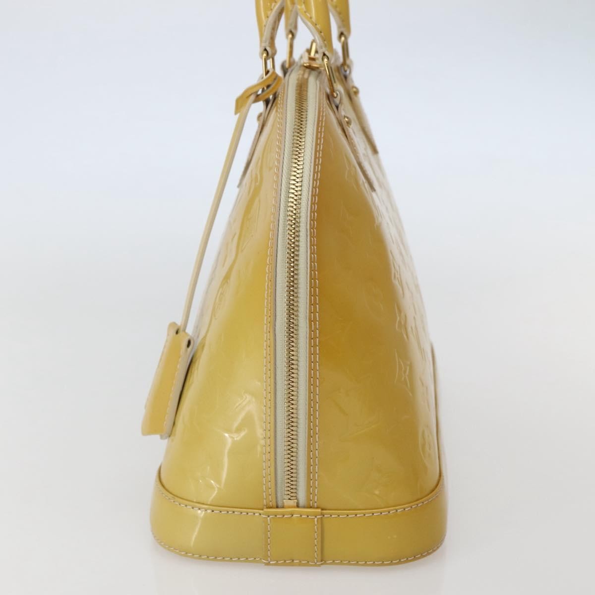 Alma Handbag Monogram Vernis PM