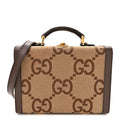 Monogram Jumbo GG Textured Dollar Calfskin Top Handle Beauty Case Camel Ebony New Acero