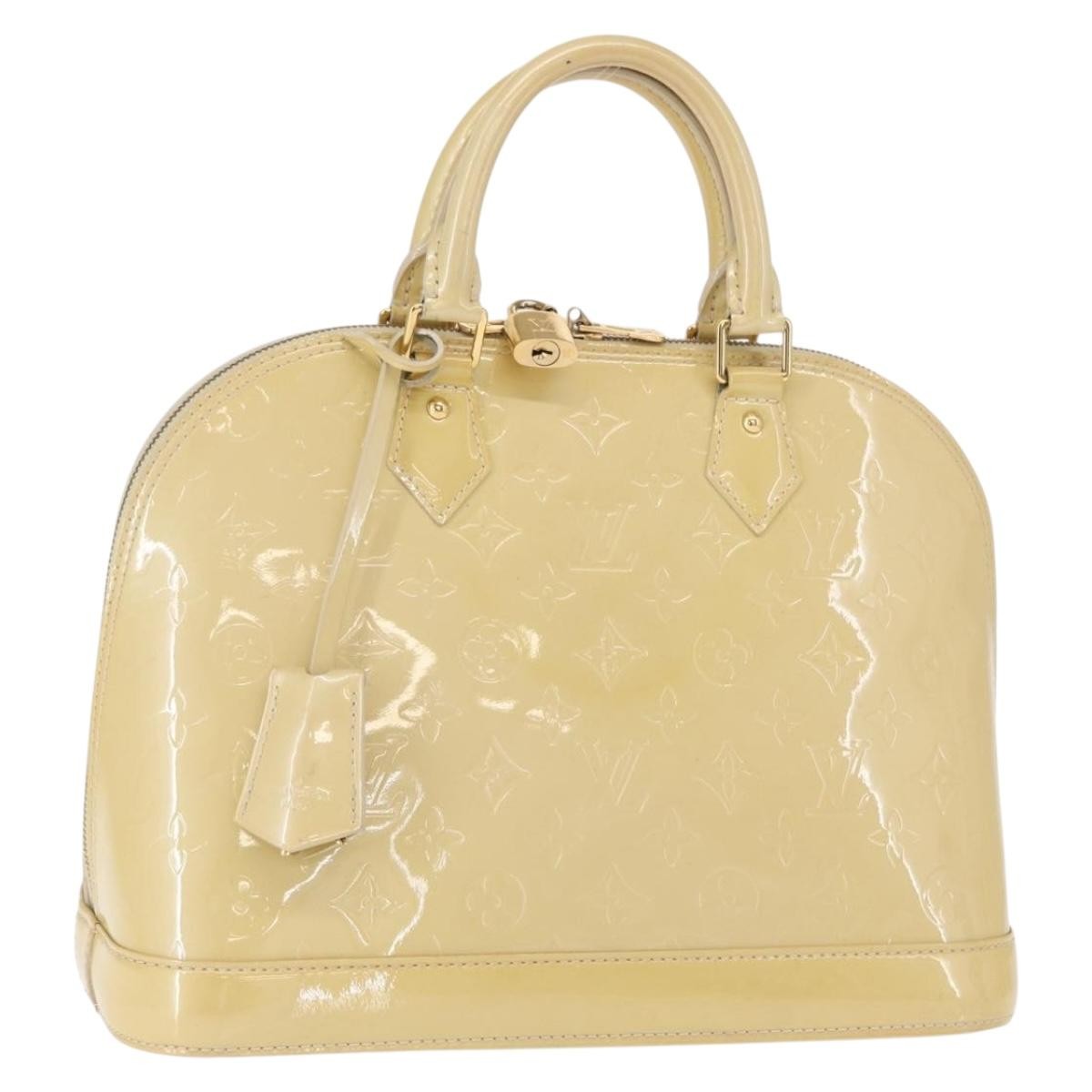 Alma Handbag Monogram Vernis PM