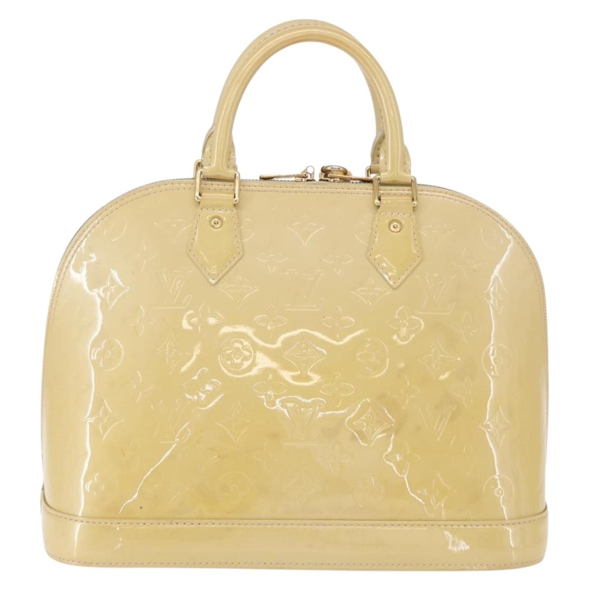 Alma Handbag Monogram Vernis PM