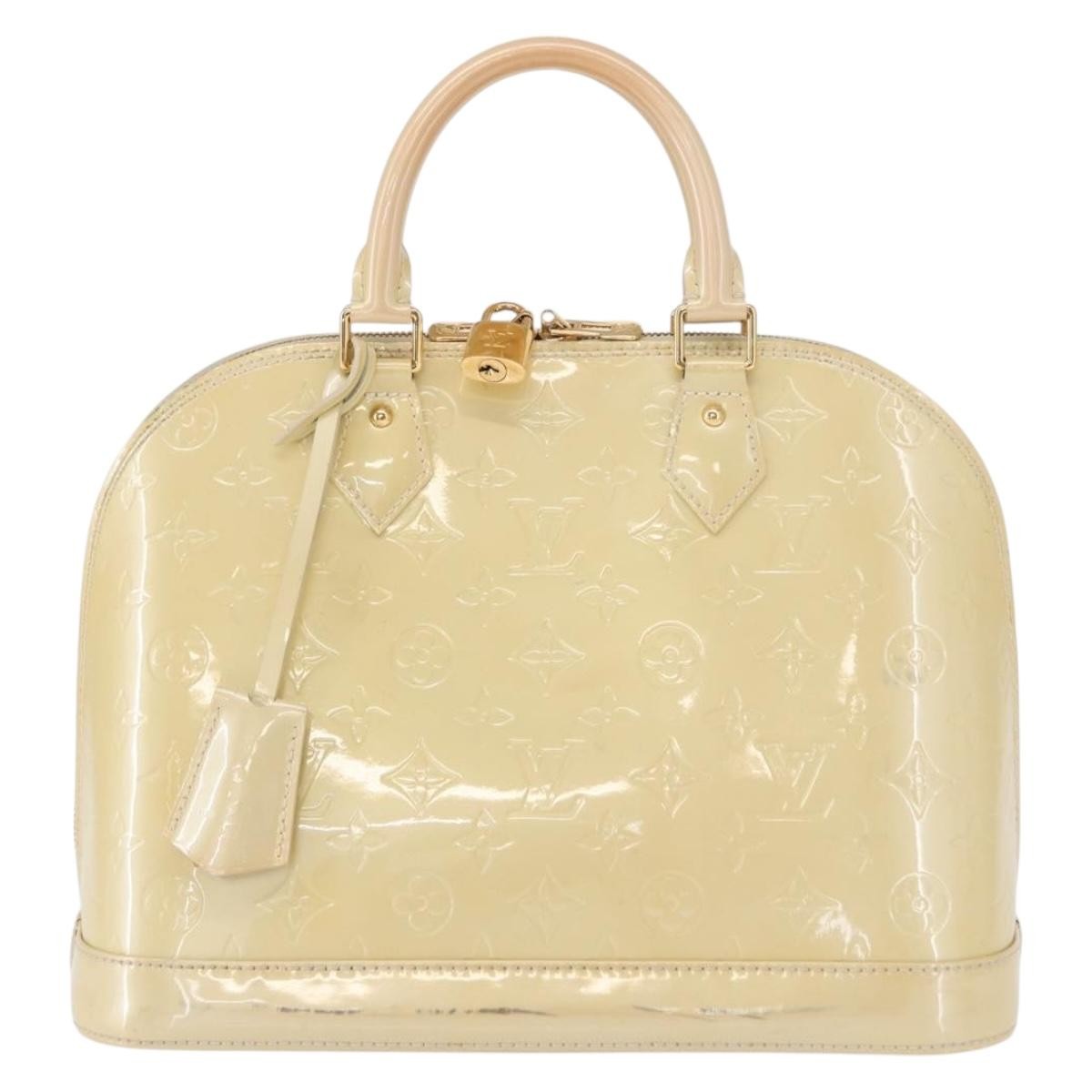 Alma Handbag Monogram Vernis PM