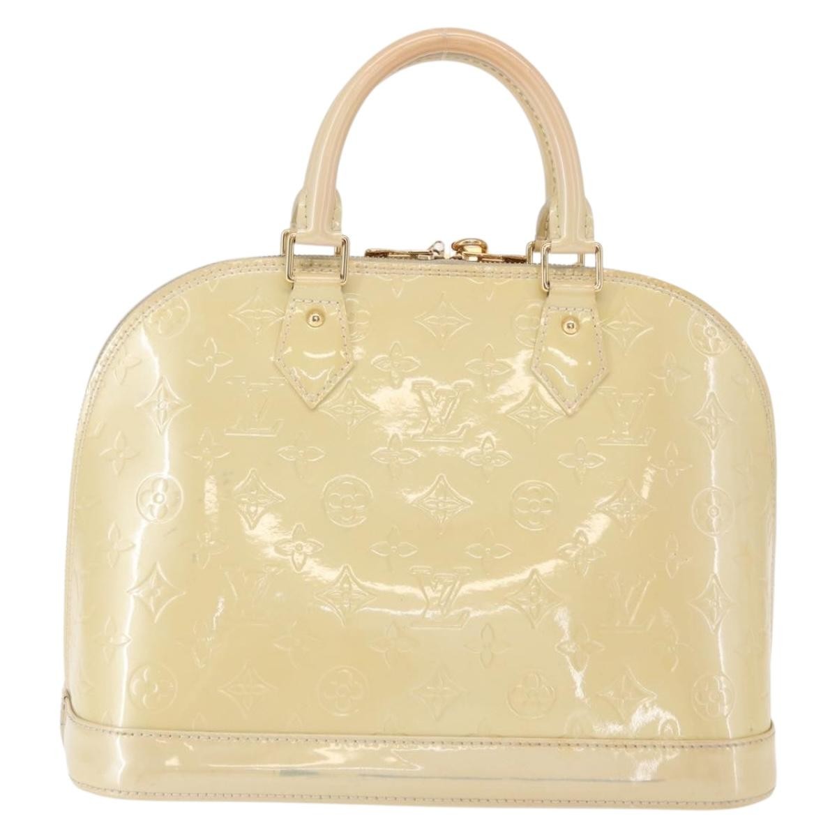 Alma Handbag Monogram Vernis PM